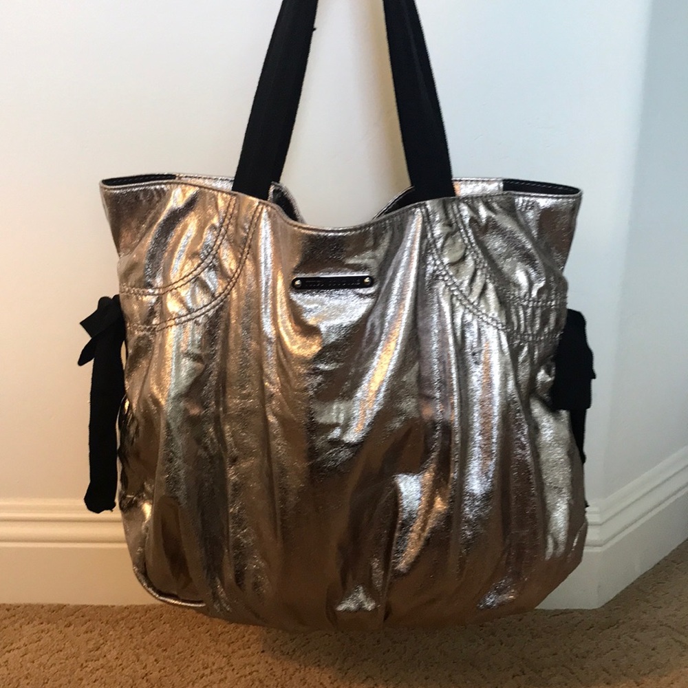 Juicy Couture silver tote bag.